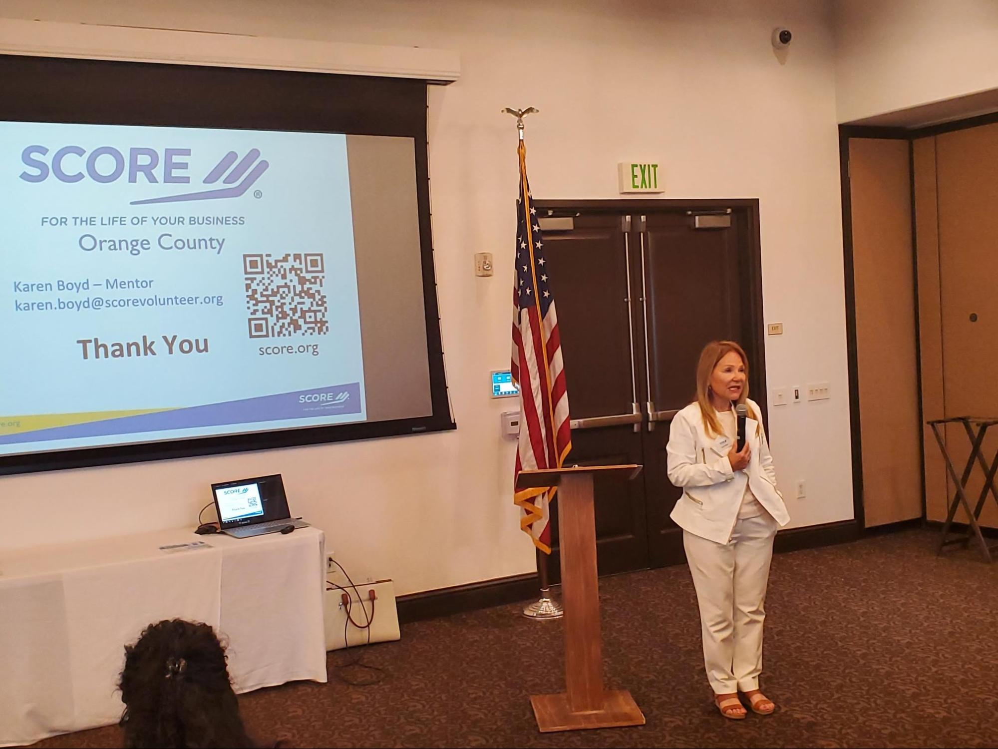 Karen Boyd of SCORE Orange County giving a presentation at the AVCC June Networking Breakfast.